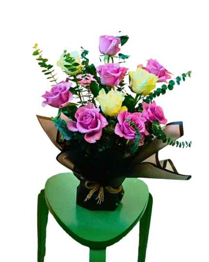 Purple and white roses with eucalyptus